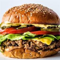 Veggie Burger · Lettuce, tomatoes, mayonnaise, ketchup on a toasty bun.