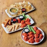 The Classic Combo · All the classic apps you love on one plate - Boneless Wings, Spinach and Artichoke Dip, Chic...