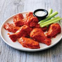 Double Crunch Bone-In Wings · Twice battered and fried, these crisp outside, tender inside wings are tossed in a choice of...