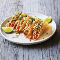 Chicken Wonton Tacos · A deliciously different way to taco. Tangy grilled chicken, sweet Asian chile sauce and dump...