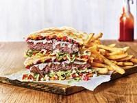 Quesadilla Burger · Part burger, part quesadilla, all taste. This original burger creation comes piled high with...