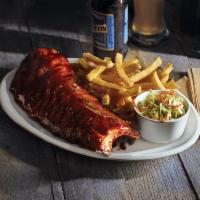 Double-Glazed Baby Back Ribs · Slow-cooked to fall off the bone tenderness. Slathered with your choice of sauce.