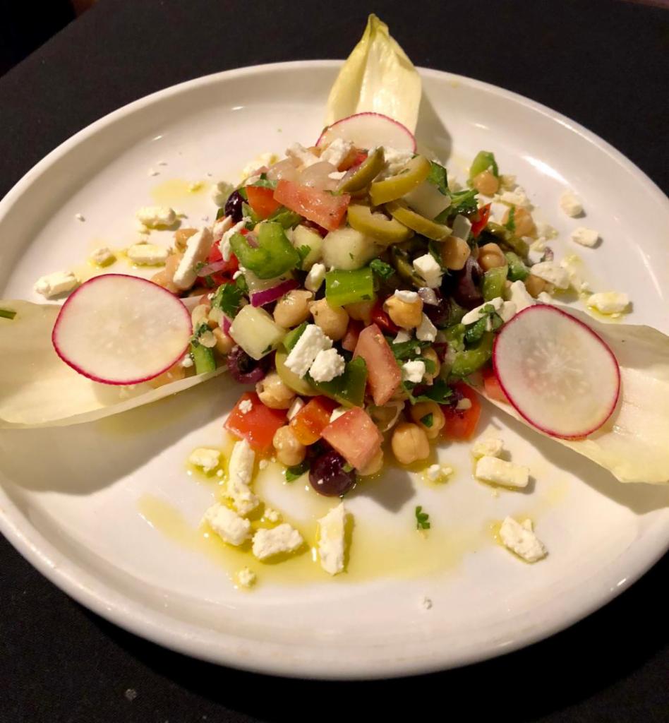 Mediterranean Salad · chopped tomatoes,cucumbers,peppers, chickpeas,green and kalamata olives, lemon vinaigrette. feta cheese 