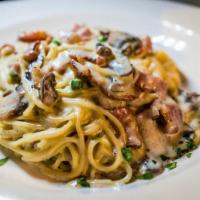 Spaghetti Carbonara · ham, crisp bacon,scallions and egg, light cream sauce