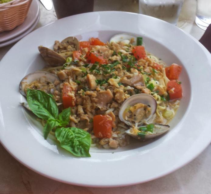 Linguine Alla Vongole · Little neck clams, tomato and white clam sauce.