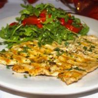 Chicken Paillard  · Arugula salad,cherry tomatoes, shaved Parmesan and lemon vinaigrette.