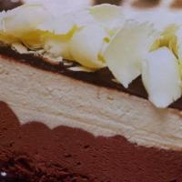 3 Chocolate Mousse · White and dark chocolate mousse on a sponge base, coated with a chocolate hazelnut glaze and...