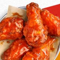 Wings · Flavorful bone-in wings tossed in your favorite sauce (hot, mild, garlic parmesan, BBQ, or p...