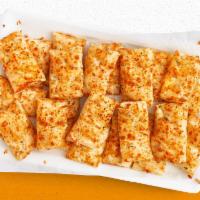 Cheesy Bread · 24 crispy, yet tender bread sticks made with our Pan dough. Brushed with garlic butter and s...