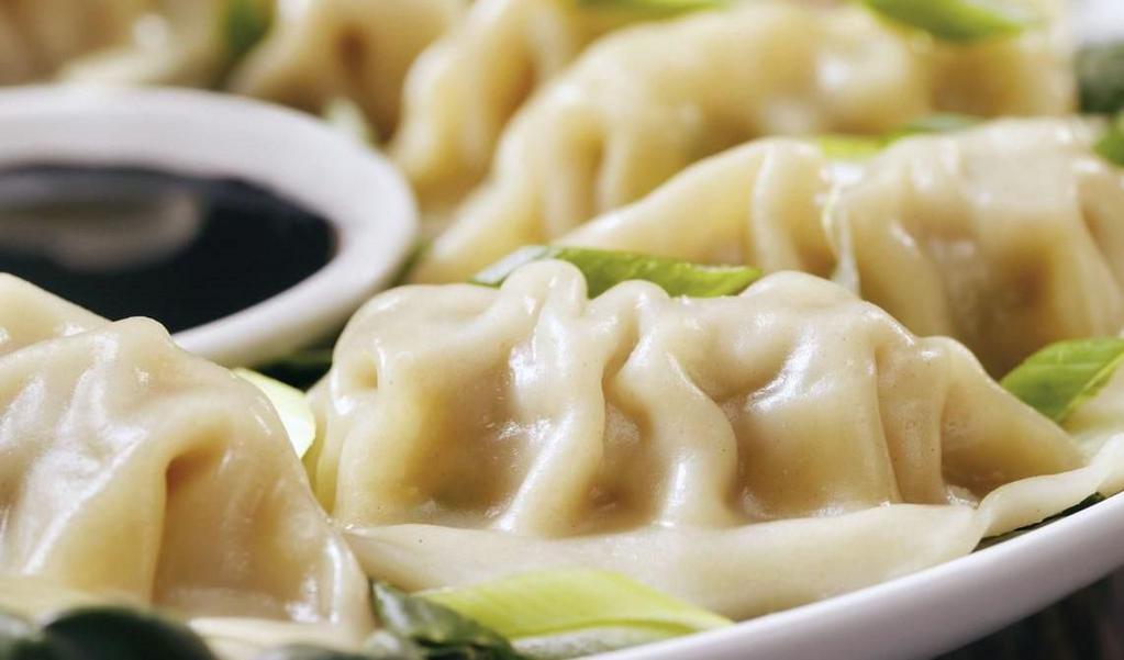 23. Vegetable Dumplings · Eight pieces.