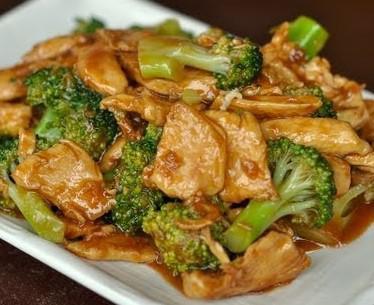 69. Chicken with Broccoli · Served with rice.