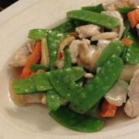 74. Chicken with Snow Peas · Served with rice.