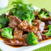 84. Beef with Broccoli · Served with rice.