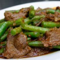 81. Beef with String Beans · Served with rice. Hot and spicy.