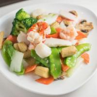 S1. Club Seafood · Lobster, crabmeat, jumbo shrimp and scallops sauteed with assorted Chinese vegetables in a w...