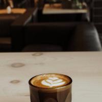 Cortado · Two shots of espresso and equal parts steamed organic whole milk.
Served as a 4 oz beverage.