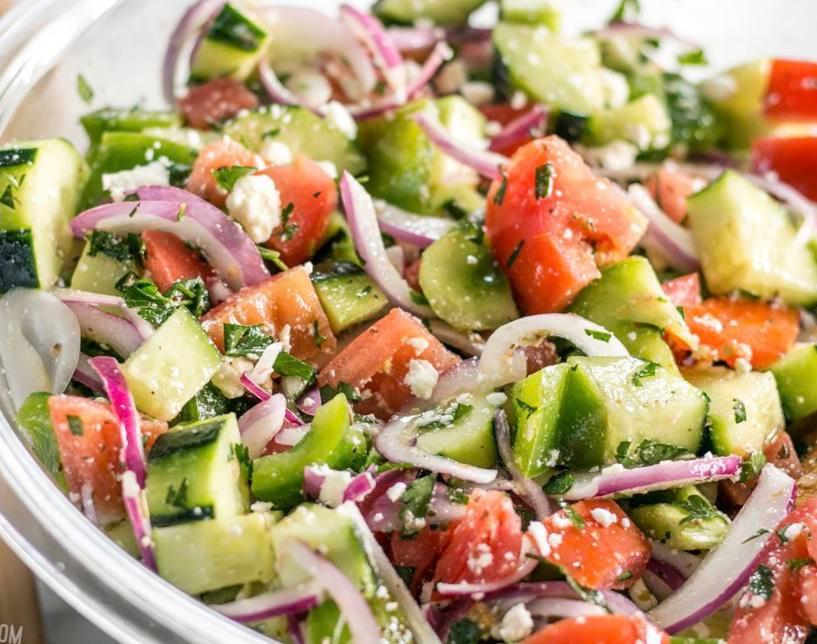 Greek Salad · Mixed greens, feta cheese, grape leaves, black olives, tomatoes, red onions and balsamic vinaigrette.