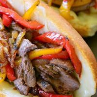 NY Steak and Cheese Sandwich · Marinated steak, melted American, sauteed onions and peppers.