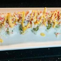 Asia Roll · Shrimp teMaura, cucumber inside,crab meat on the top,  spicy mayo and eel sauce.