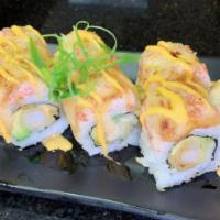 Yum Yum Crab Roll · Shrimp tempura, avocado and cucumber inside, baked crab meat with yum yum sauce on top, eel ...