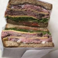 Roast Beef Sandwich Deluxe · Roast beef, Swiss cheese, lettuce, tomato, onion, pickles and horseradish mayo.