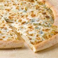 Spinach Alfredo Pizza · Rich and creamy garlic Parmesan Alfredo sauce blended with spinach.