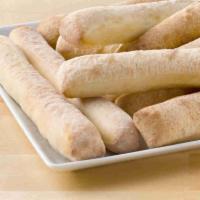 Breadsticks · Fresh, oven-baked dough.