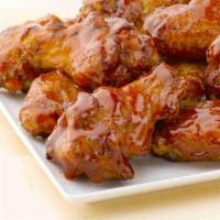 BBQ Wings · Bone-in wings are oven baked and covered in a bold BBQ sauce.