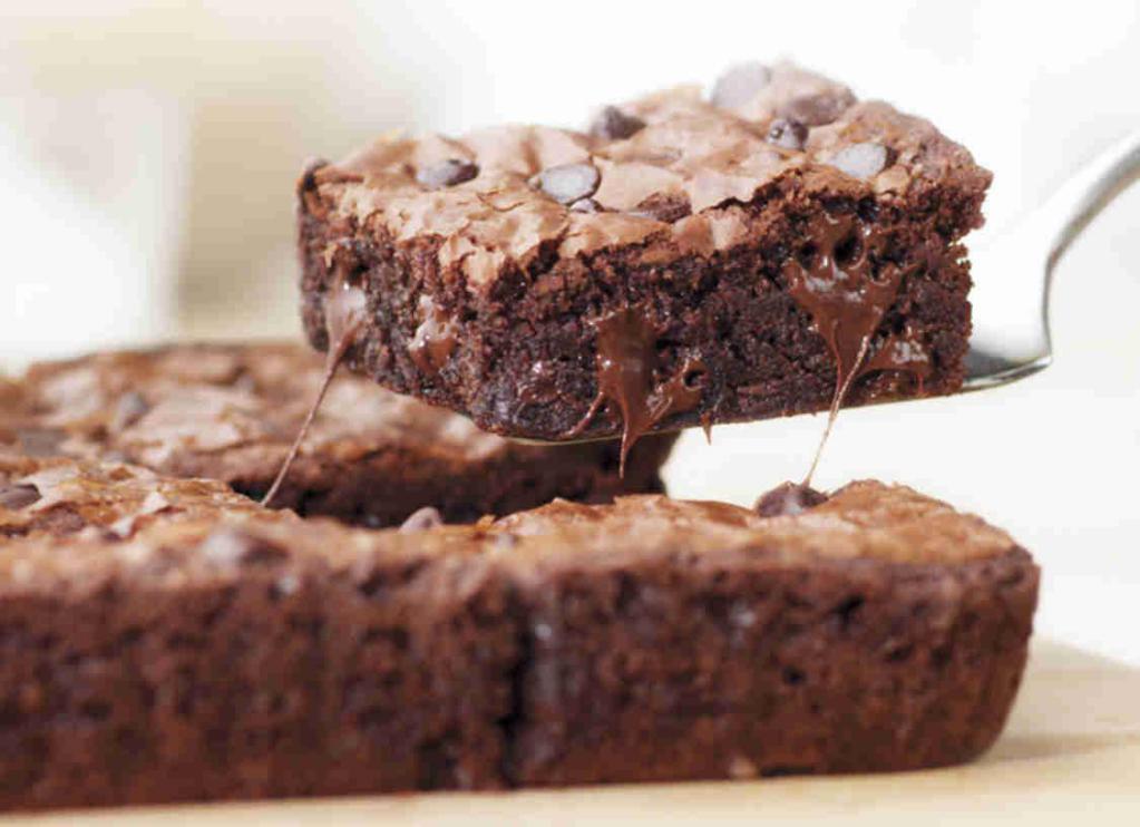 Double Chocolate Chip Brownie · Filled with chocolate chips, baked fresh and cut into 9 squares. Served warm.