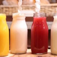 Natural Juice on Milk or Water · Mango, papaya, blackberry, strawberry, passion fruit, soursop, banana or pineapple.