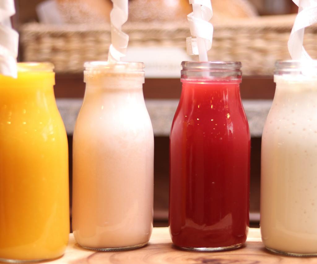 Natural Juice on Milk or Water · Mango, papaya, blackberry, strawberry, passion fruit, soursop, banana or pineapple.