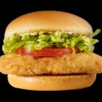Crispy Chicken Sandwich · Juicy all-white meat fried chicken breast topped with crisp lettuce, ripe tomatoes, and sala...