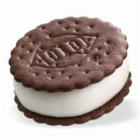 DQ® Sandwich (1) · Cold, creamy DQ® vanilla soft serve, nestled between two chocolate flavored wafers.