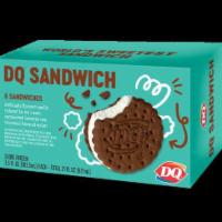 DQ® Sandwich (6 Pack) · Cold, creamy DQ® vanilla soft serve, nestled between two chocolate flavored wafers.
