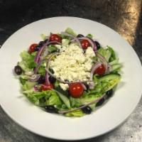 Greek Salad · Romaine lettuce, tomatoes, cucumbers, Kalamata olives, onions, and feta cheese with dressing.