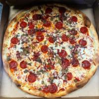 Meat Deluxe Pizza · Pepperoni, sausage, ham, bacon, and ground beef.