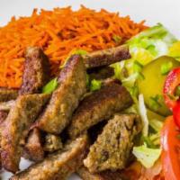 Lamb Over Rice with Salad · Slow-cooked lamb served with basmati rice and lettuce tomatoes, onions, pickles, olives, and...