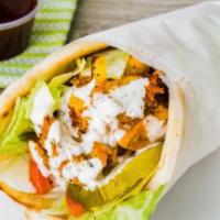 Chicken Gyro · Boneless chicken marinated in our special Middle Eastern spice mix served on pita with lettu...