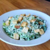 Caesar Salad · Crisp hearts of romaine lettuce with garlic croutons dressed in our classic Caesar dressing ...