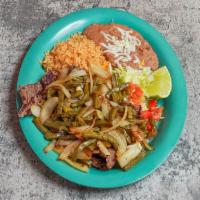 Grilled Steak / Platillo Carne Asada · skirt steak served with grilled onions, jalapeno pepper, rice, beans and tortillas.