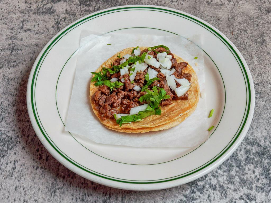 Taco Dinner  · 3 tacos meat of your choice serve with cilantro and onions.