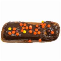 Peanut Butter in my Chocolate · Cream filled long john with chocolate icing and mini Reese's Pieces