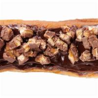 Snickeroo · Cream filled long john with chocolate icing and crushed snickers. 