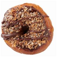 Samoa · Coconut + Chocolate = Zen. Glazed donut with toasted coconut and chocolate drizzle. 