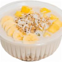 The Hawaiian Bowl · Base: Cocout Cream, Banana
Toppings: Granola, Banana, Pineapple, Coconut Shaving 
