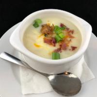Loaded Baked Potato Soup · Hearty loaded baked potato soup topped with Monterey Jack and cheddar cheeses, crispy bacon ...