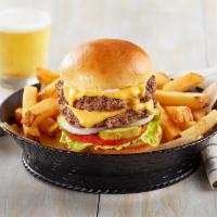 The Double Stack Burger · Not 1 but 2 juicy burgers layered with melted American cheese with lettuce, tomato, onion, p...