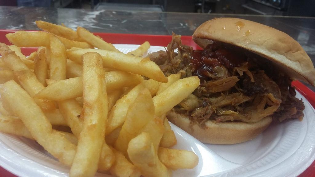 #2. Chopped B.B.Q. Beef Sandwich Special · Served with 1 side order & soft drink.