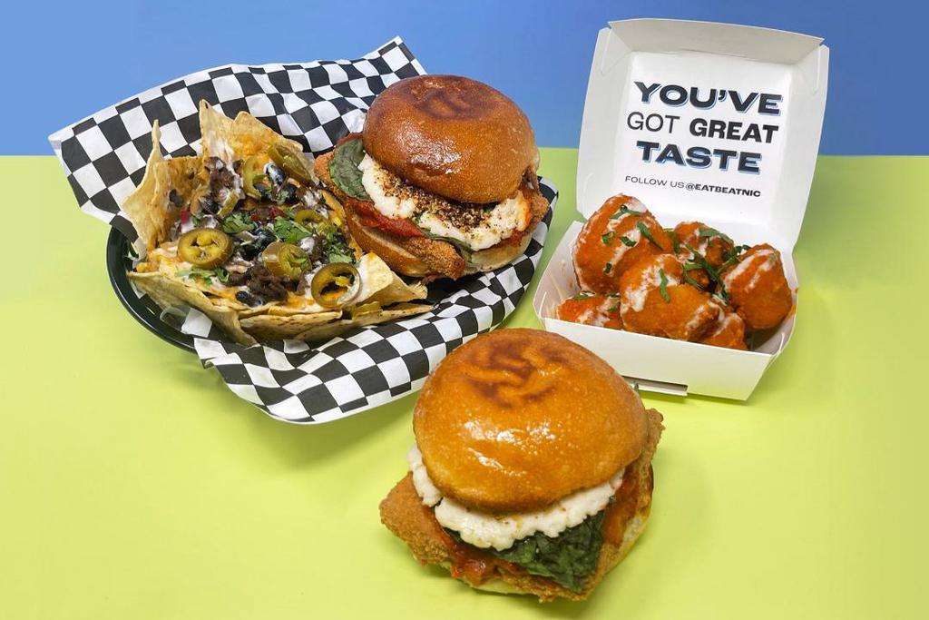 Big Game Bundle · 1 Order of Buffalo Cauli Poppers, 1 Order of Loaded Shroom Nachos, and 2 Chicky Parm Sandwiches. Feeds 2-3
Contains: Gluten, Soy, Treenuts