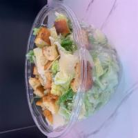 Caesar Salad · Romain lettuce, homemade croutons, Parmigiano, homemade dressing.